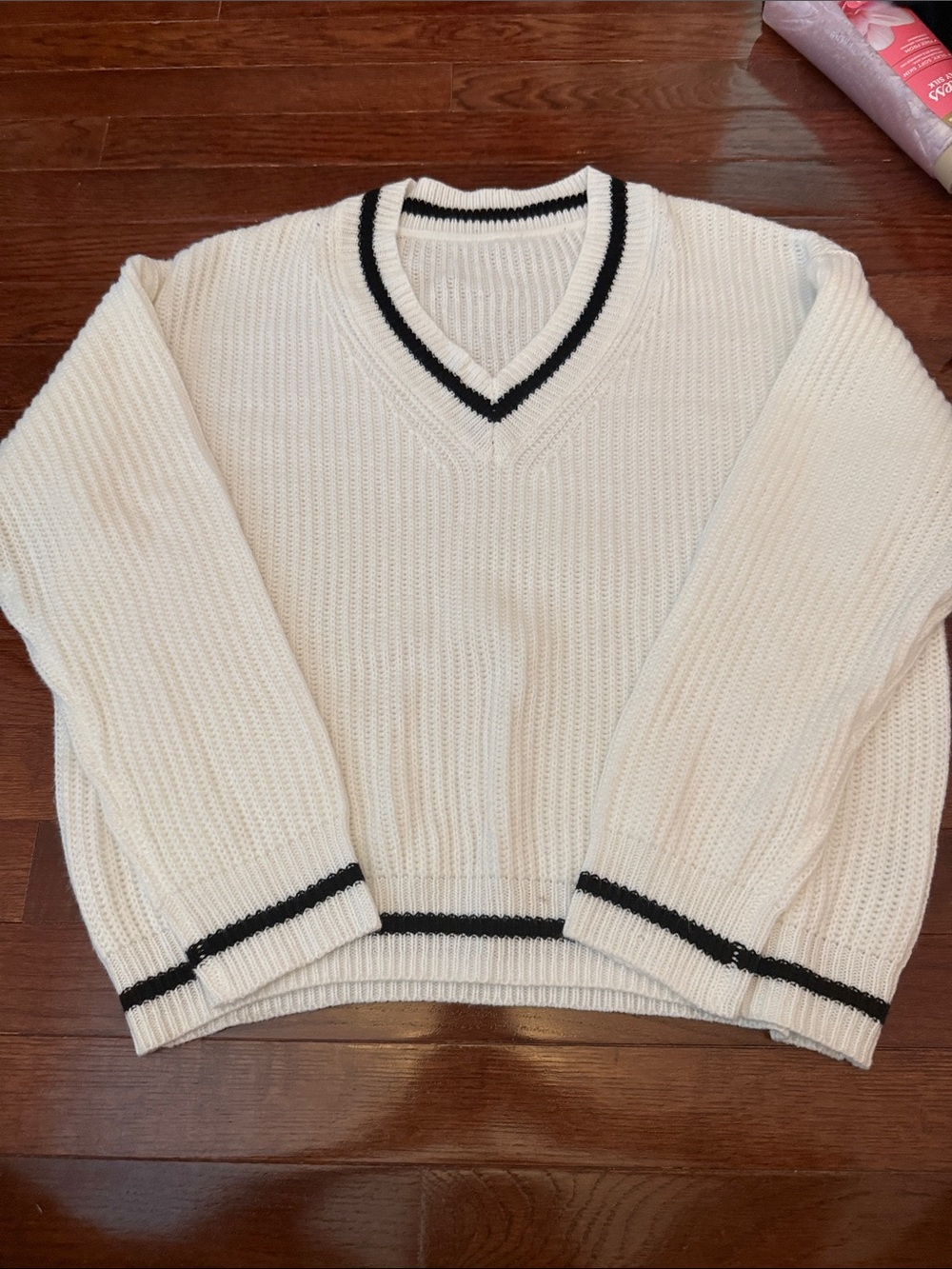 Cropped White V-Neck Sweater with Black Stripe Accents